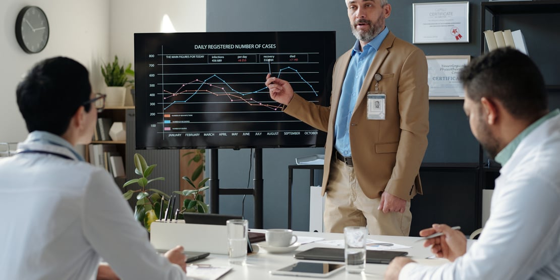 person-pointing-a-chart