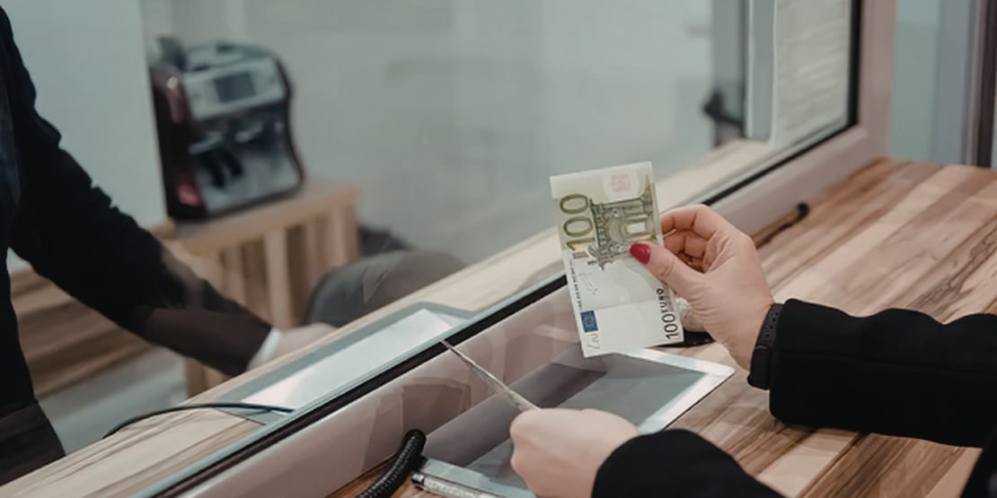 person-paying-at-window