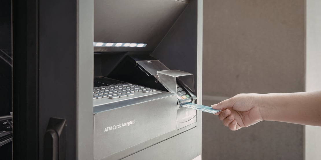person-using-atm